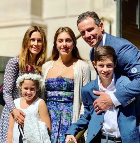 Cristina Greeven Cuomo poses with husband Chris Cuomo and their three children.