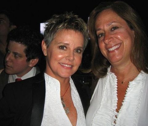 Carrie Schenken poses a picture with Amanda Bearse.