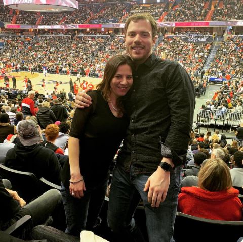 Jillian Angeline poses a picture with her brother Victor at a NBA match.