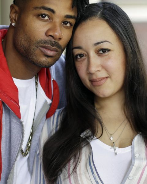Cyntoia Brown Long  in right poses with her  husband Jaime Long.