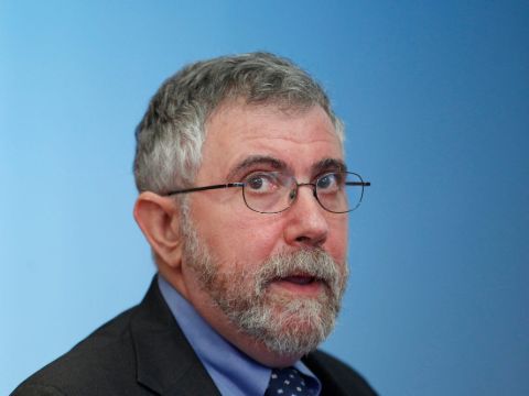 Paul Krugman in a black suit caught on the camera.