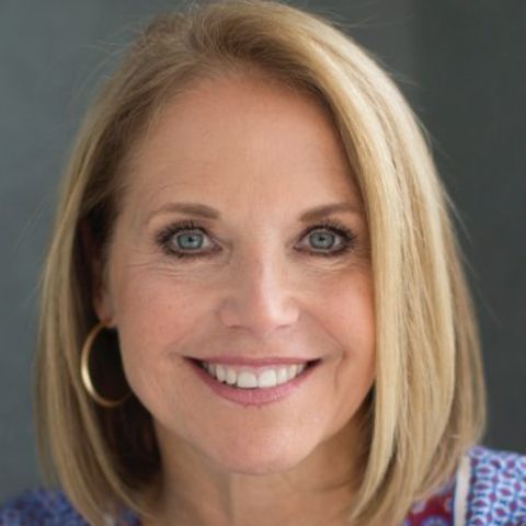 Katie Couric in a blonde hair poses for a picture.