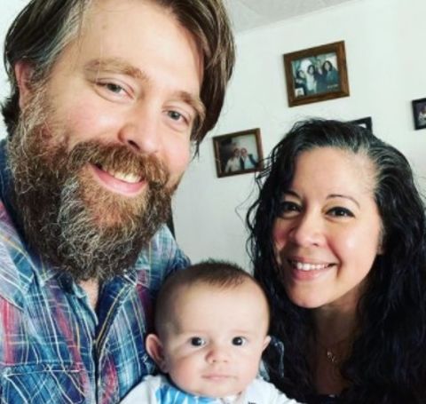 Gina Brillon with her husband and their son.