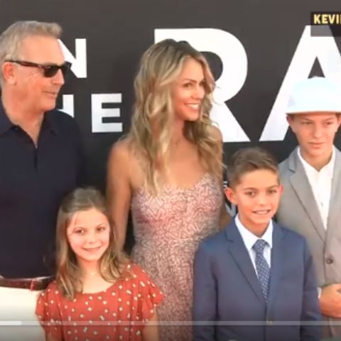 Cayden Wyatt Costner with his family during an event